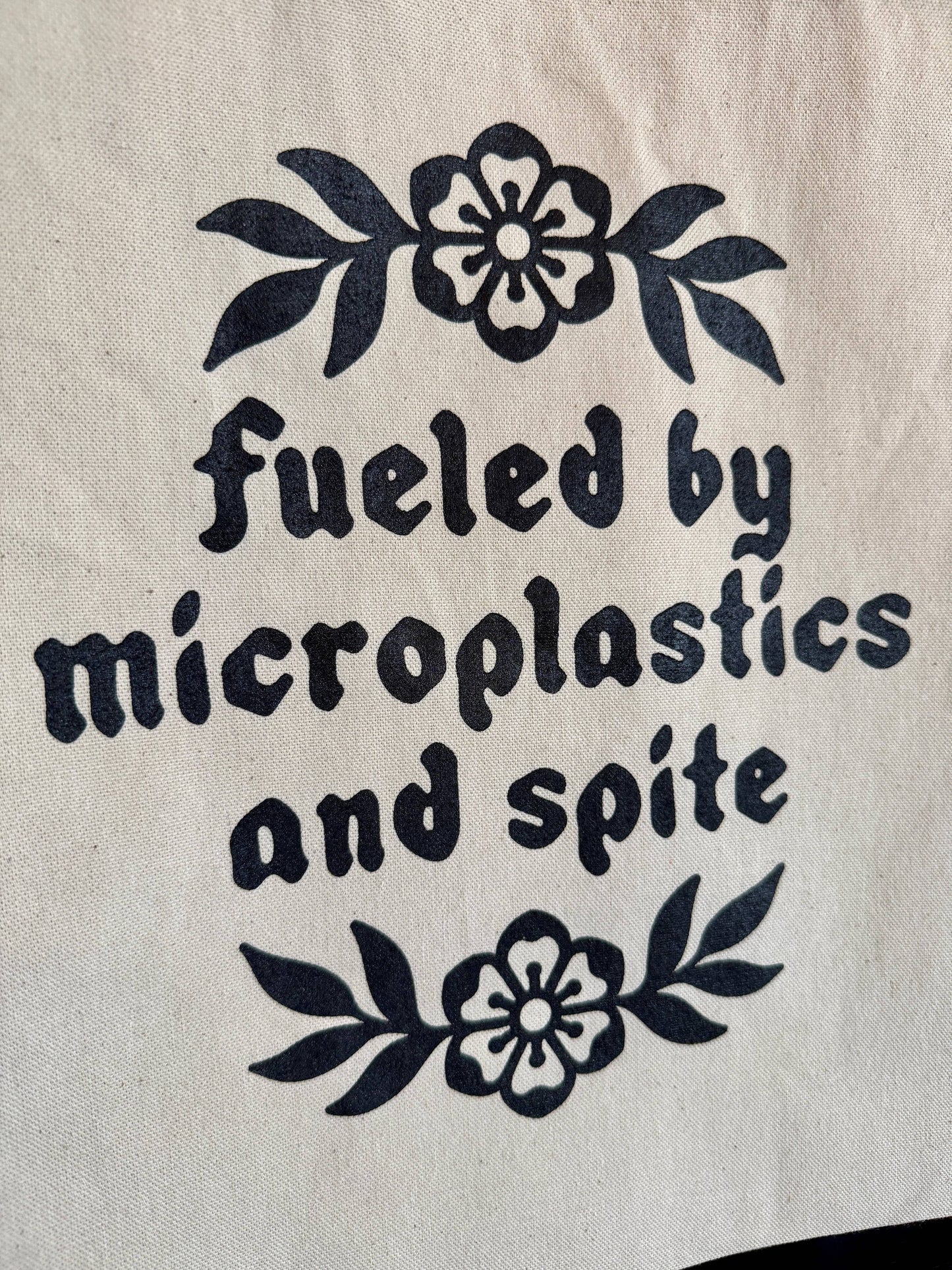 Fueled by Microplastics and Spite Tote Bag
