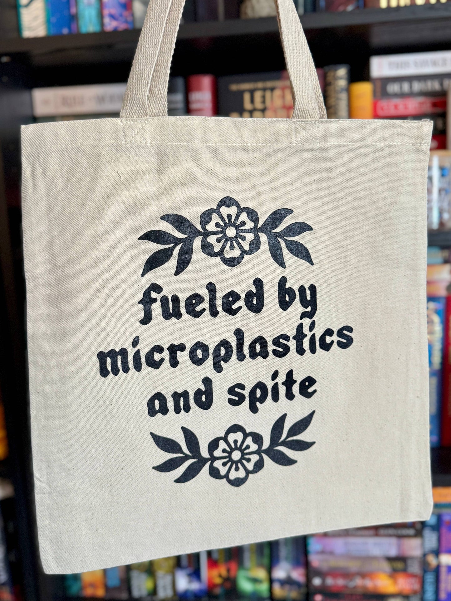Fueled by Microplastics and Spite Tote Bag