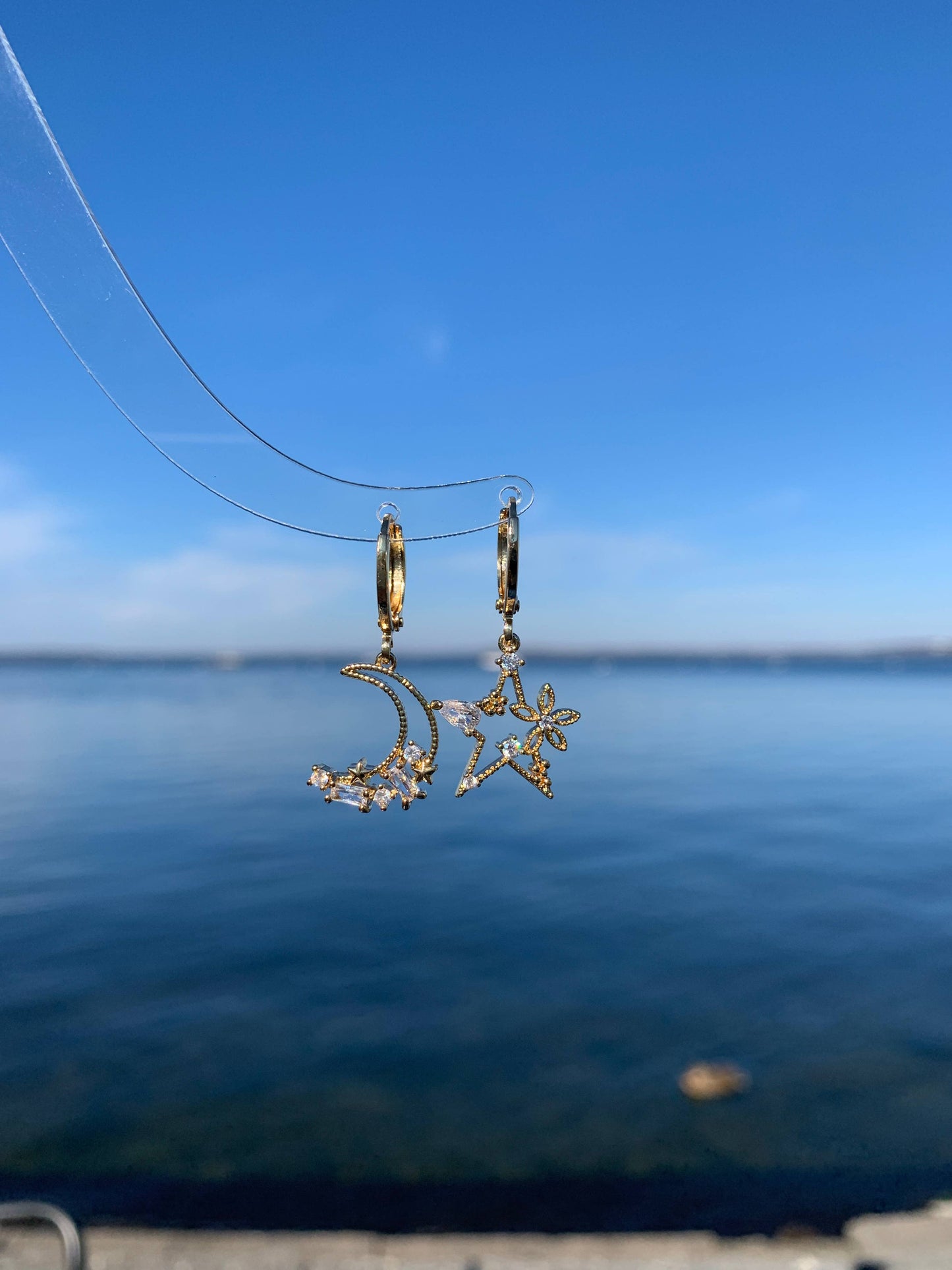 Dainty Star And Moon Dangle Earrings