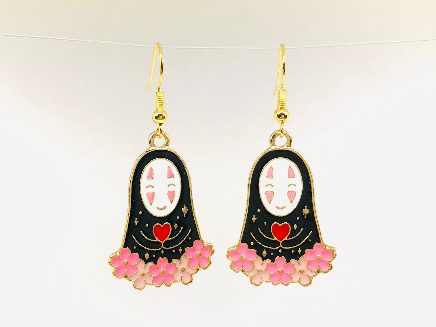 No Face Flower Fish Wire Earrings