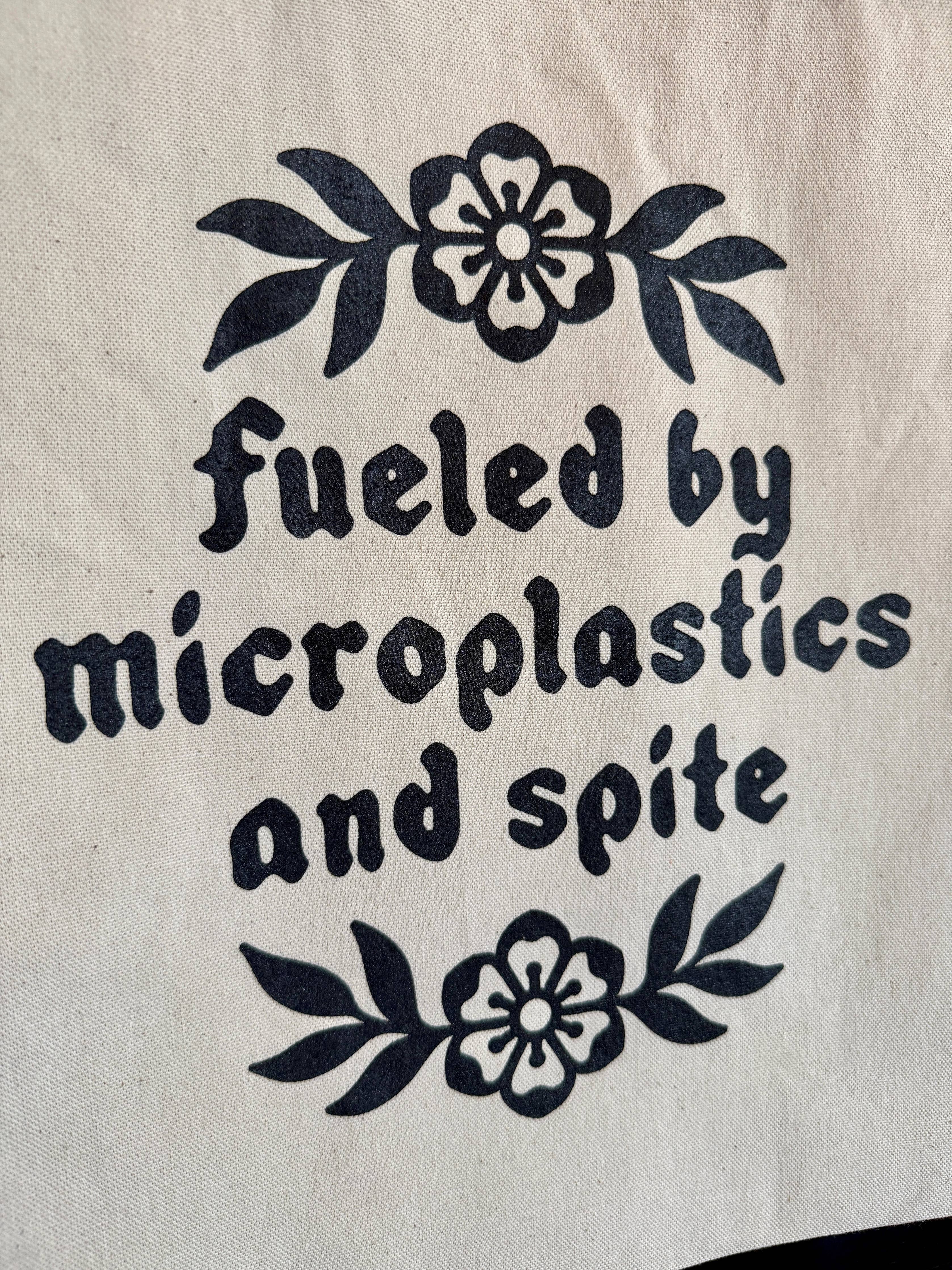 Fueled by Microplastics and Spite Tote Bag