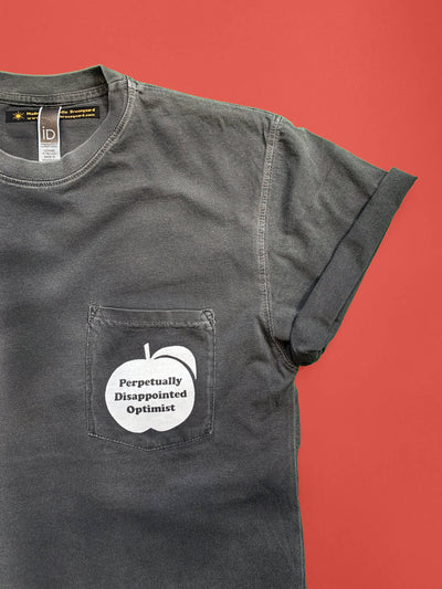 Perpetually Disappointed Optimist Pocket Tee