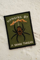 Hanging by a Thread Embroidered Sticky Patch-1